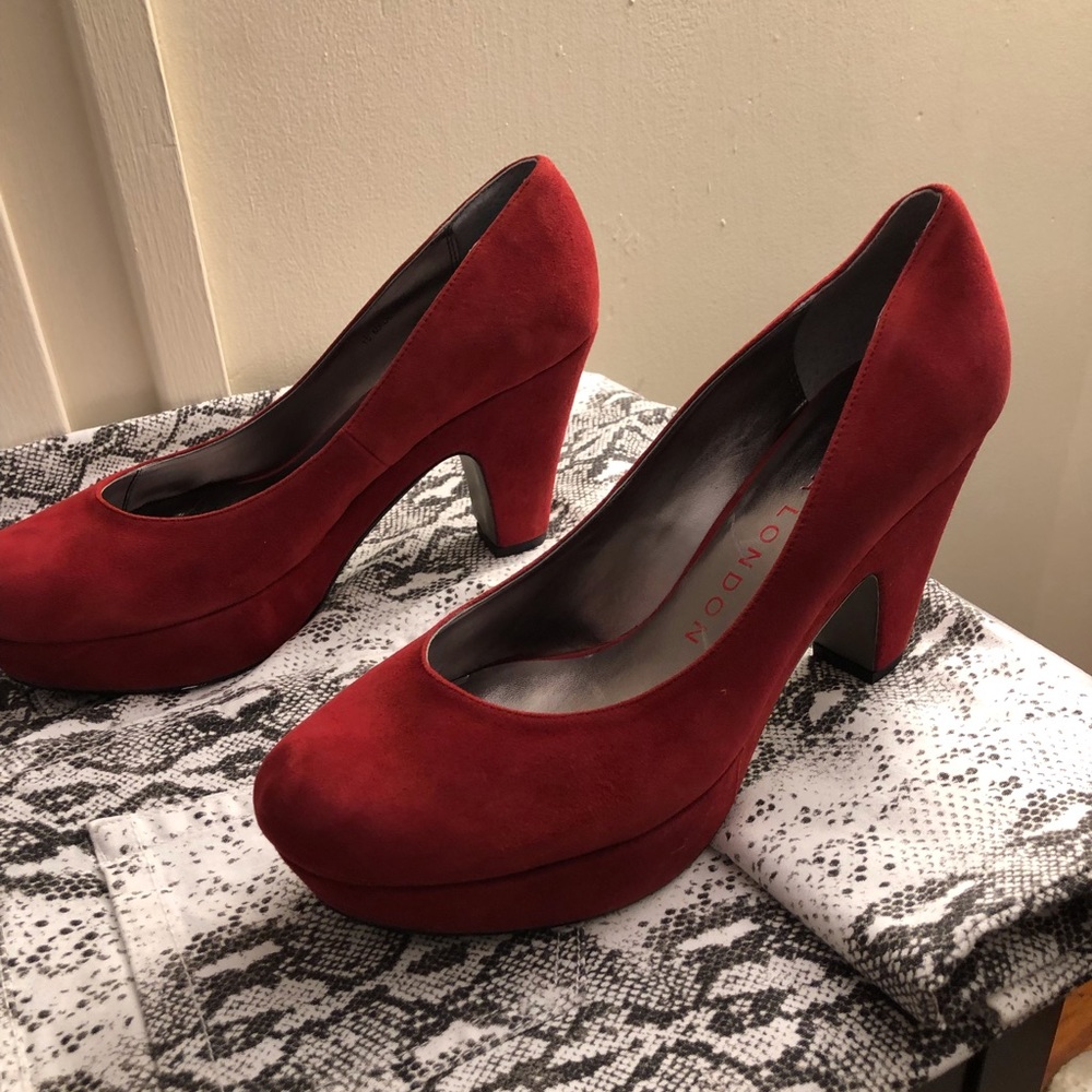 Red suede platform pumps